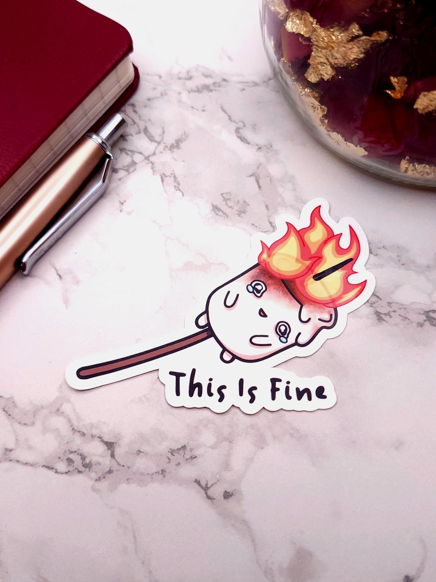 This is Fine Burning Marshmallow Vinyl Sticker