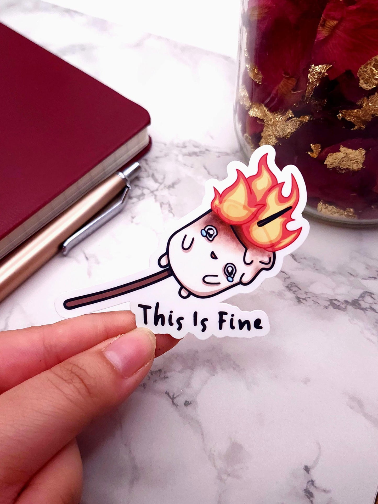 This is Fine Burning Marshmallow Vinyl Sticker