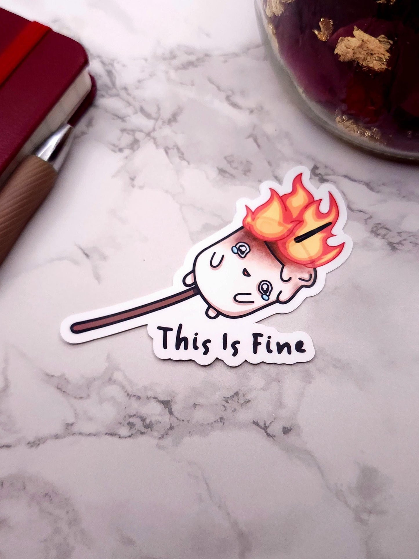 This is Fine Burning Marshmallow Vinyl Sticker