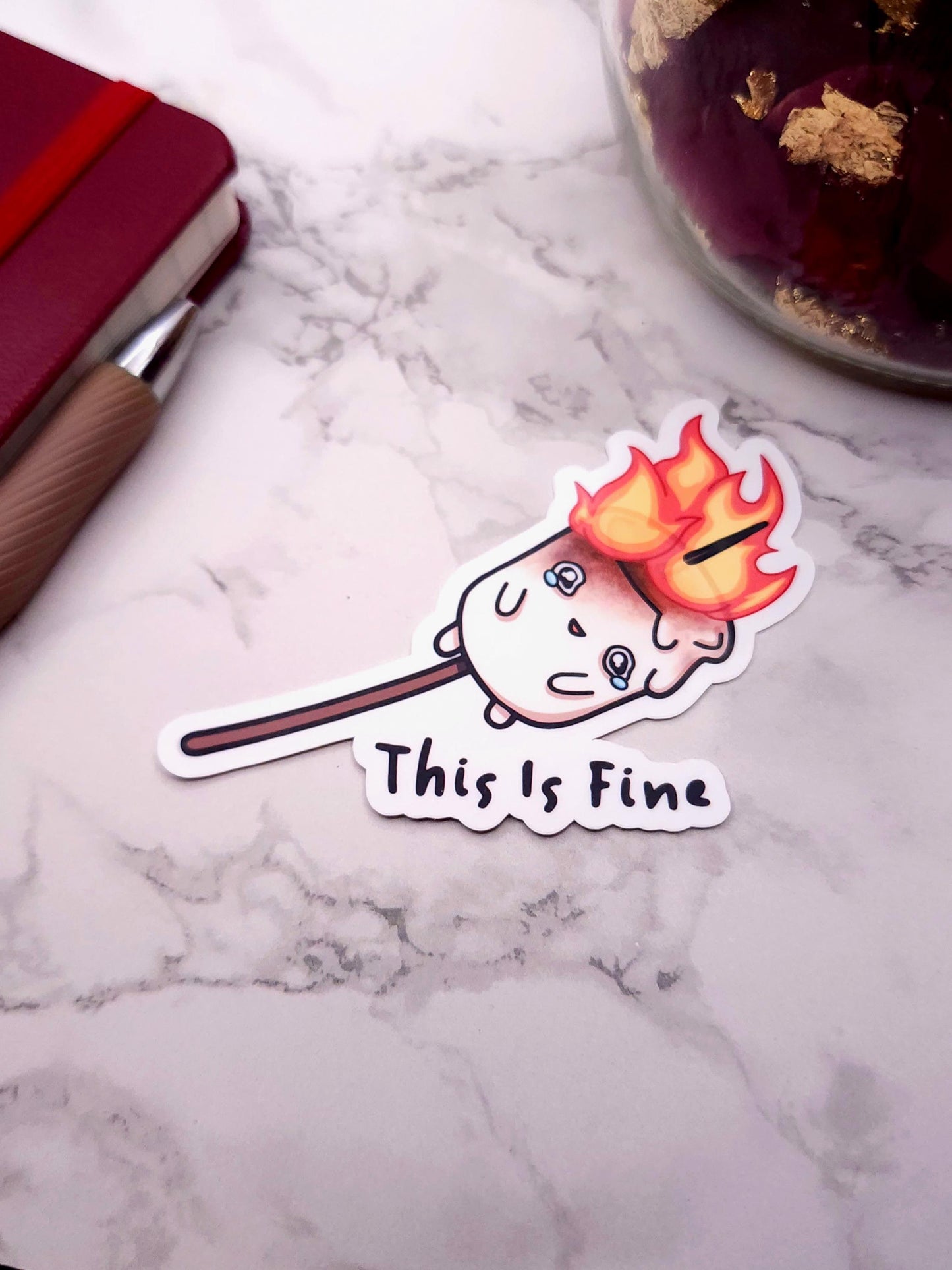 This is Fine Burning Marshmallow Vinyl Sticker
